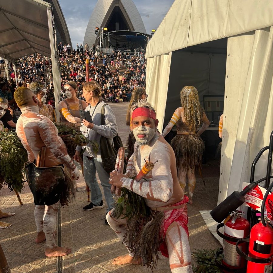 Ryka Ali in ochre outside the Sydney Opera House before performing